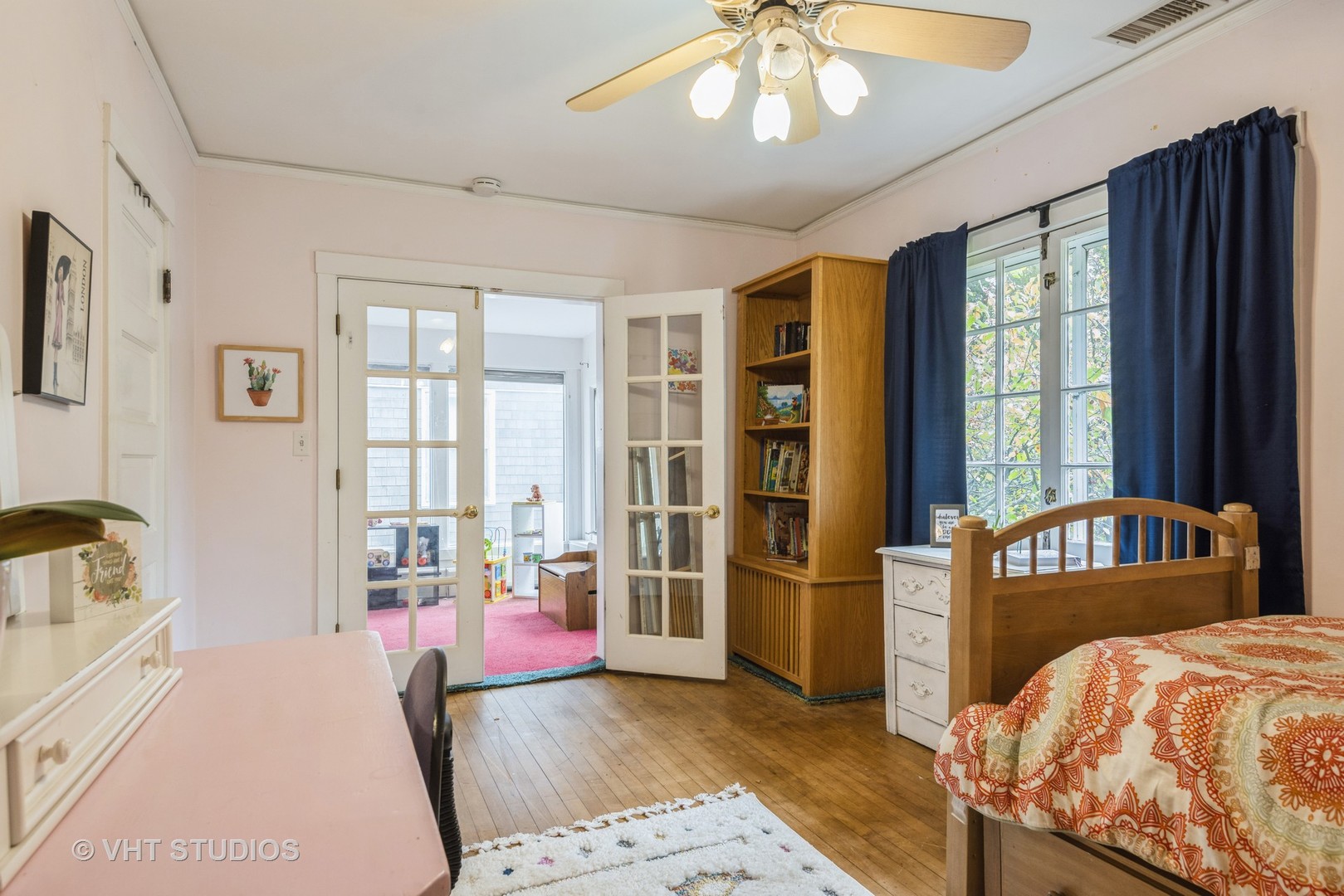 2415 Harrison Street Evanston, IL 60201 - Photo 25 of 42 a bedroom with furniture and large windows