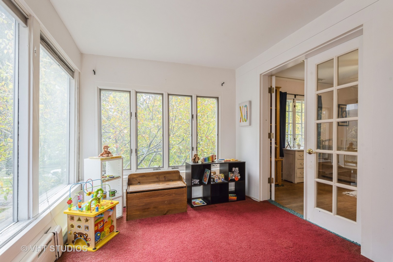 2415 Harrison Street Evanston, IL 60201 - Photo 27 of 42 a bedroom with furniture and a large window
