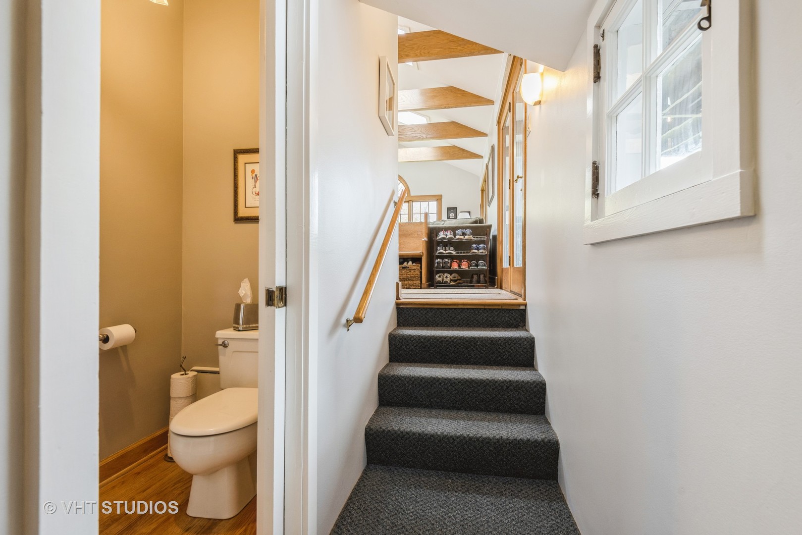 2415 Harrison Street Evanston, IL 60201 - Photo 33 of 42 a bathroom with a toilet and a shower