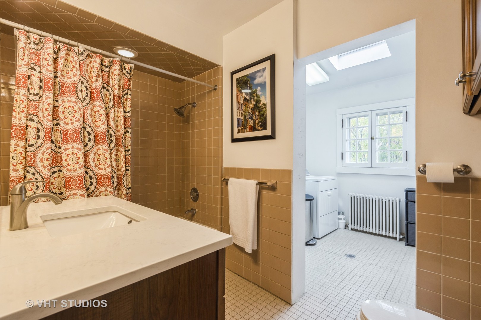 2415 Harrison Street Evanston, IL 60201 - Photo 37 of 42 a bathroom with a sink toilet and shower
