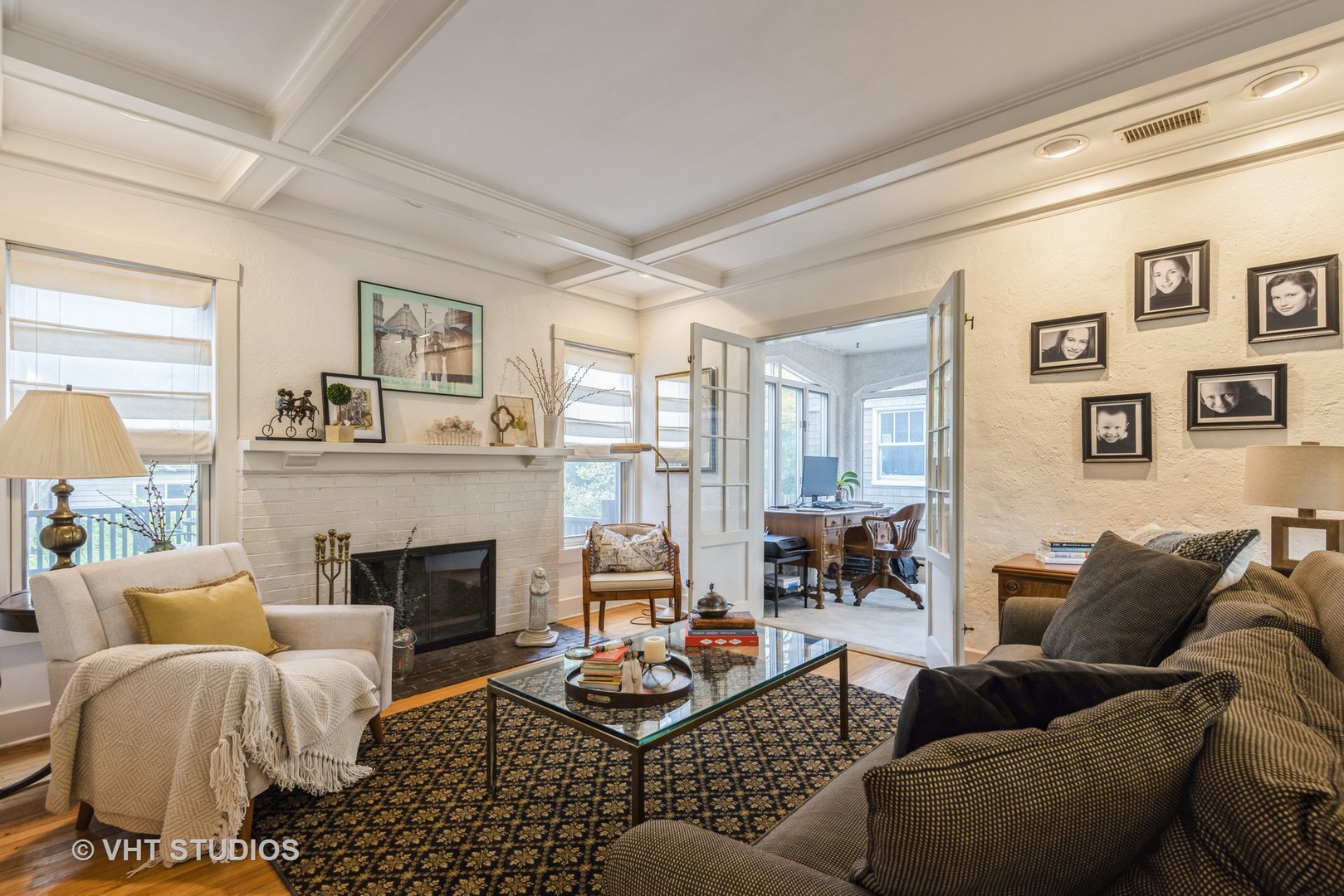 2415 Harrison Street Evanston, IL 60201 - Photo 5 of 42 a living room with furniture fireplace and a table