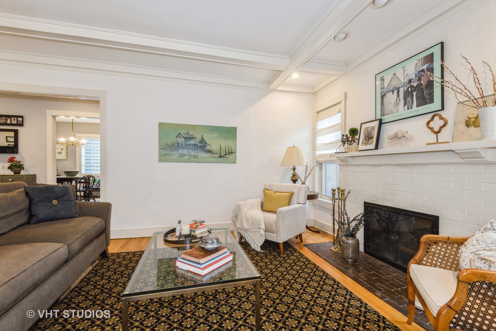 2415 Harrison Street Evanston, IL 60201 - Photo 6 of 42 a living room with furniture and a fireplace