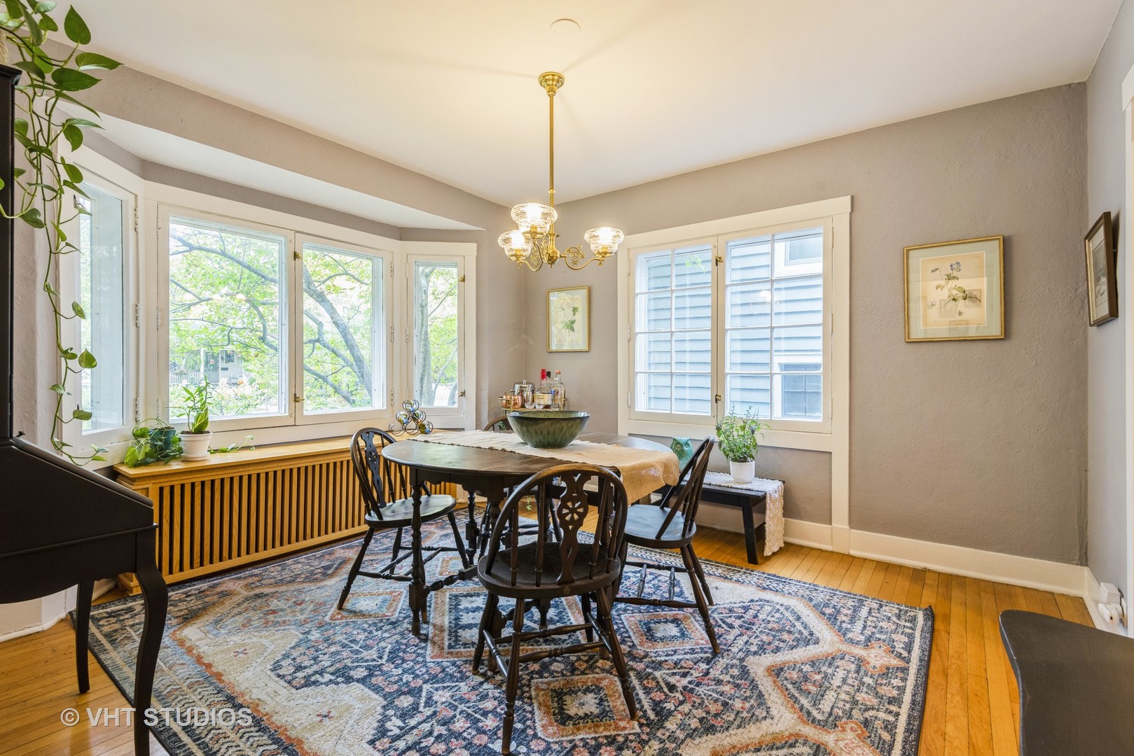 2415 Harrison Street Evanston, IL 60201 - Photo 10 of 42 a view of a dining room with furniture window and outside view