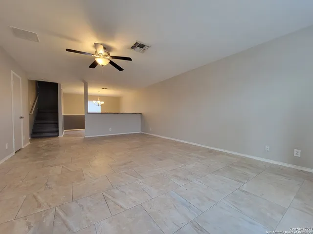 a view of a livingroom with wooden floor