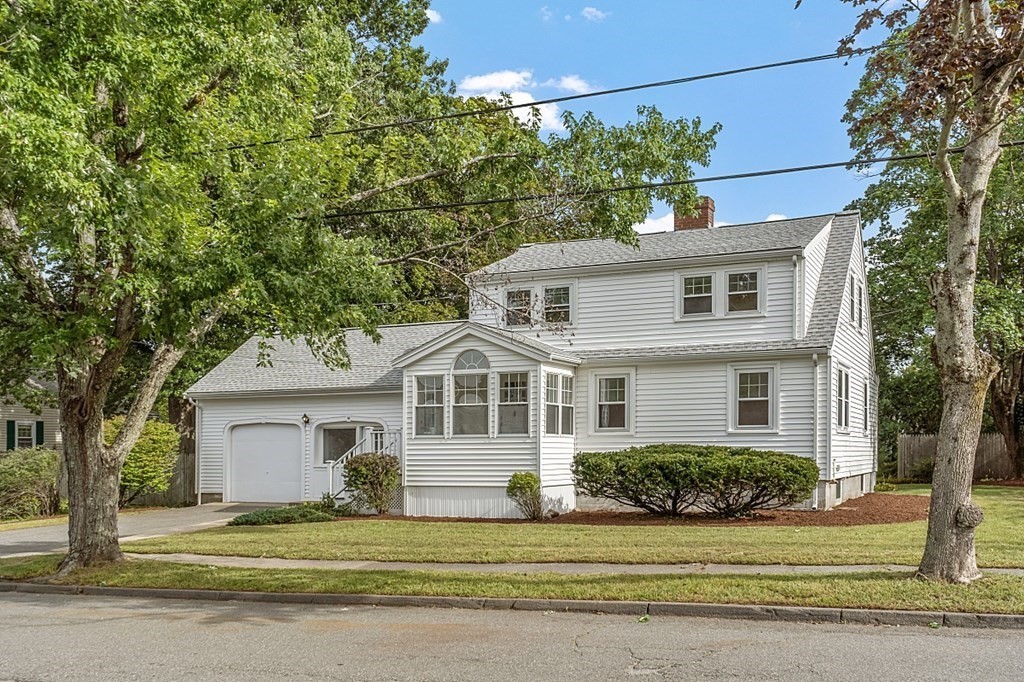 18 Beaver Park Danvers, MA 01923 - Photo 2 of 42 a front view of a house with a garden