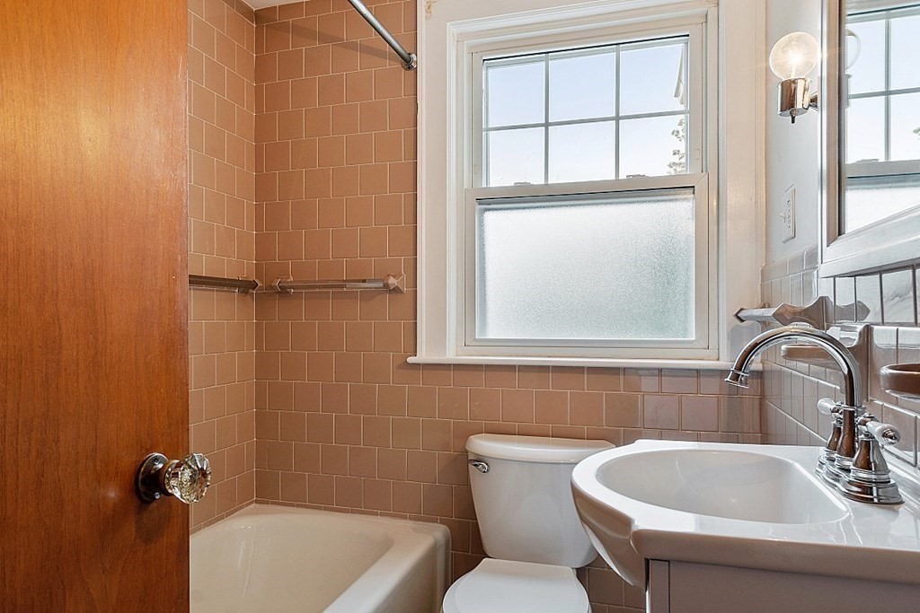 18 Beaver Park Danvers, MA 01923 - Photo 24 of 42 a bathroom with a sink toilet and shower