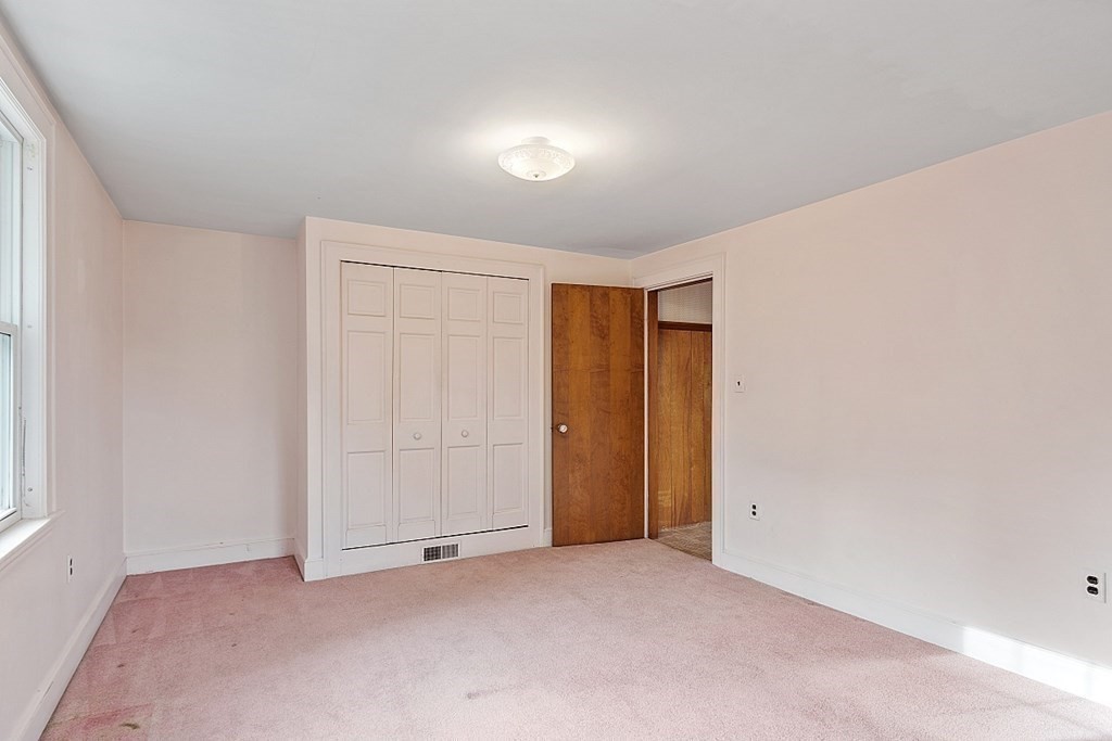18 Beaver Park Danvers, MA 01923 - Photo 25 of 42 an empty room with closet area