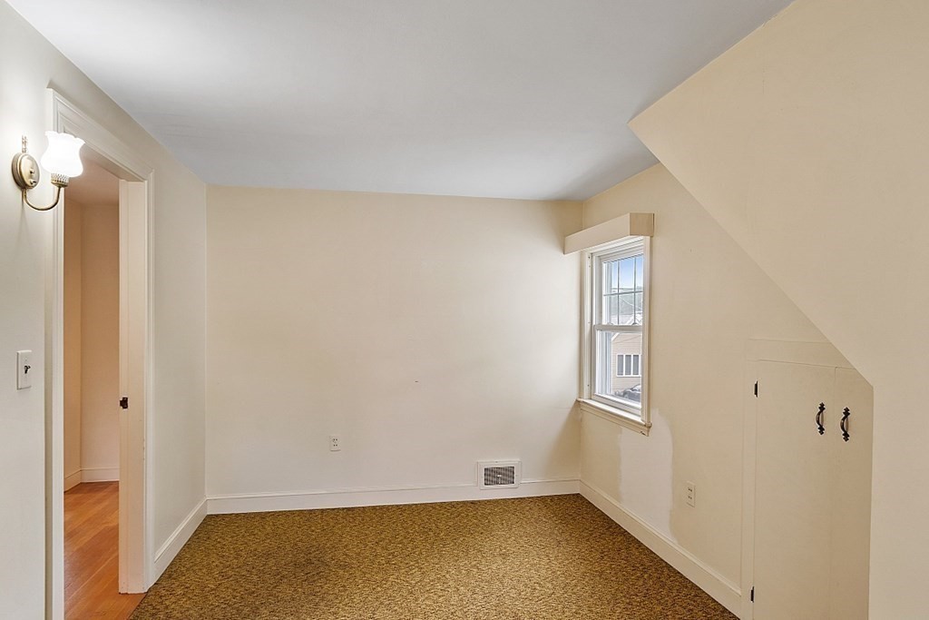18 Beaver Park Danvers, MA 01923 - Photo 32 of 42 an empty room with a empty space and windows