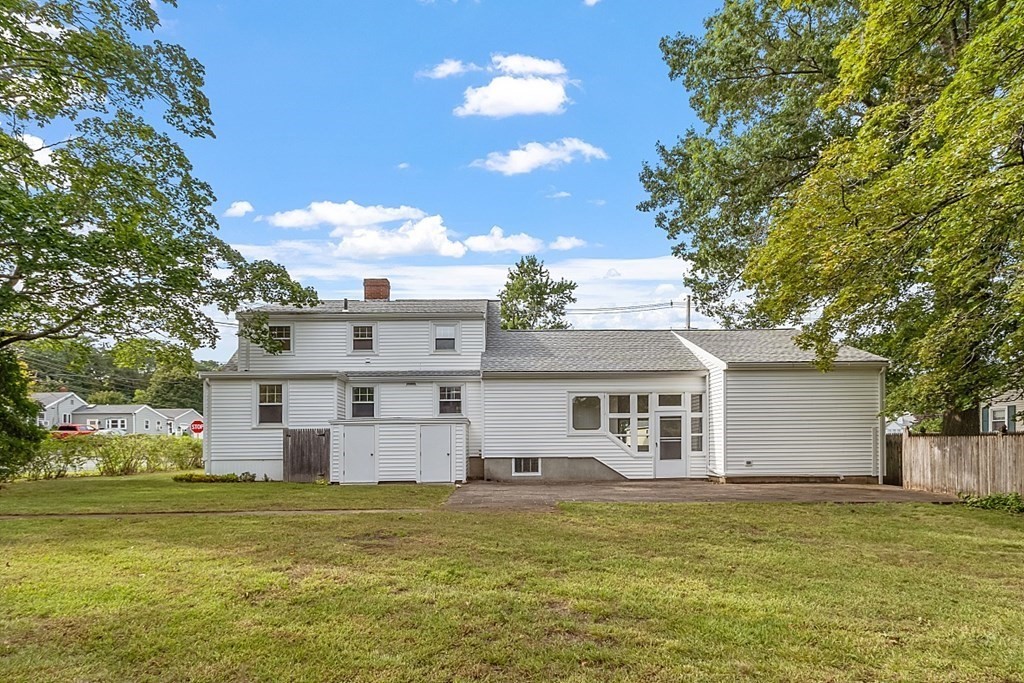 18 Beaver Park Danvers, MA 01923 - Photo 4 of 42 a view of a big house with a big yard and large tree