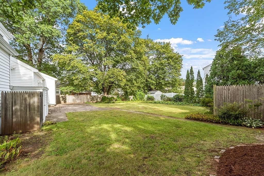 18 Beaver Park Danvers, MA 01923 - Photo 8 of 42 a view of a backyard with large trees