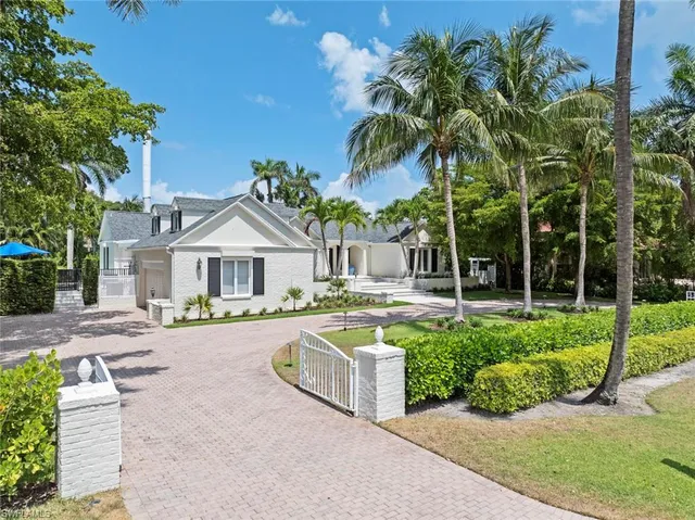 a front view of a house with swimming pool