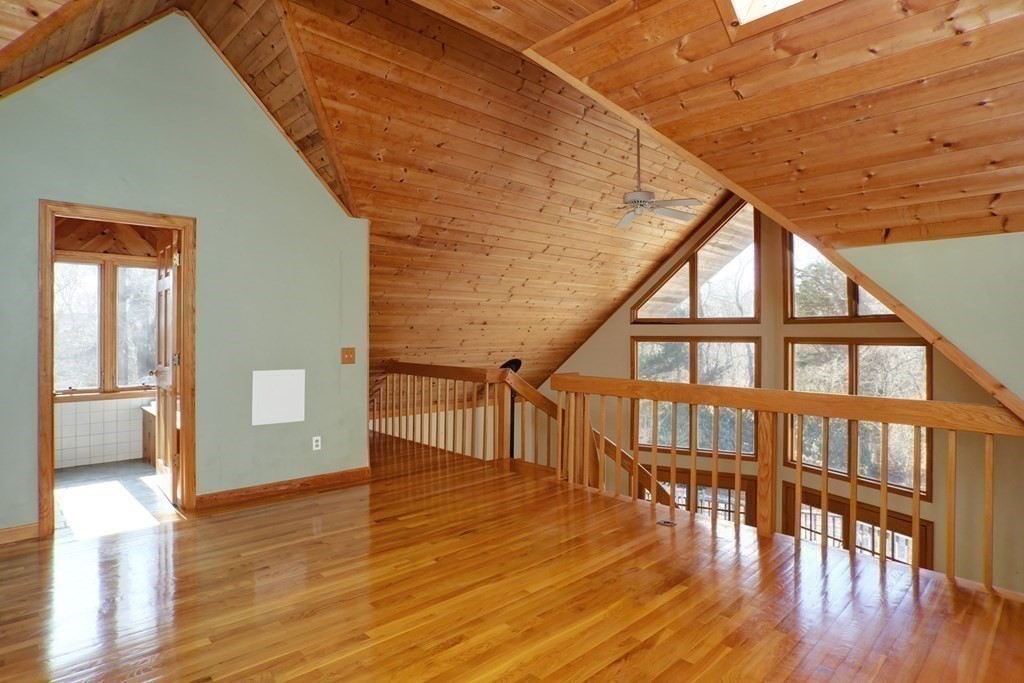 20 Damon Road Falmouth, MA 02540 - Photo 14 of 42 a view of a livingroom with wooden floor and stairs