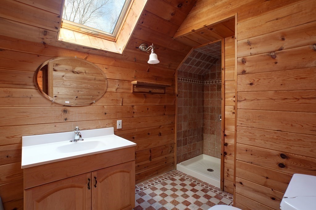 20 Damon Road Falmouth, MA 02540 - Photo 31 of 42 a bathroom with a sink a toilet and shower