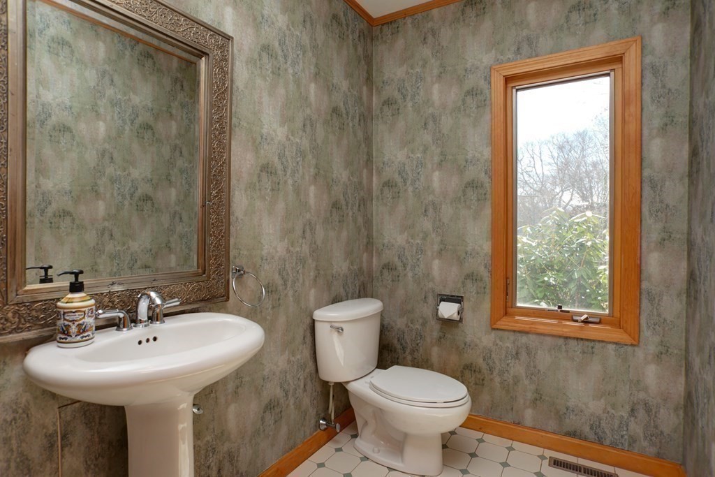 20 Damon Road Falmouth, MA 02540 - Photo 10 of 42 a bathroom with a sink a toilet and a mirror