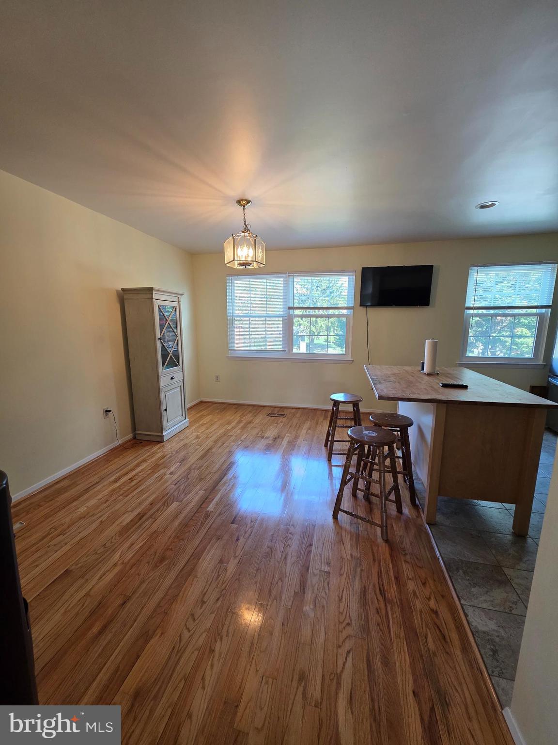 10 Casey Court Baltimore, MD 21228 - Photo 16 of 28 a living room with furniture and a wooden floor