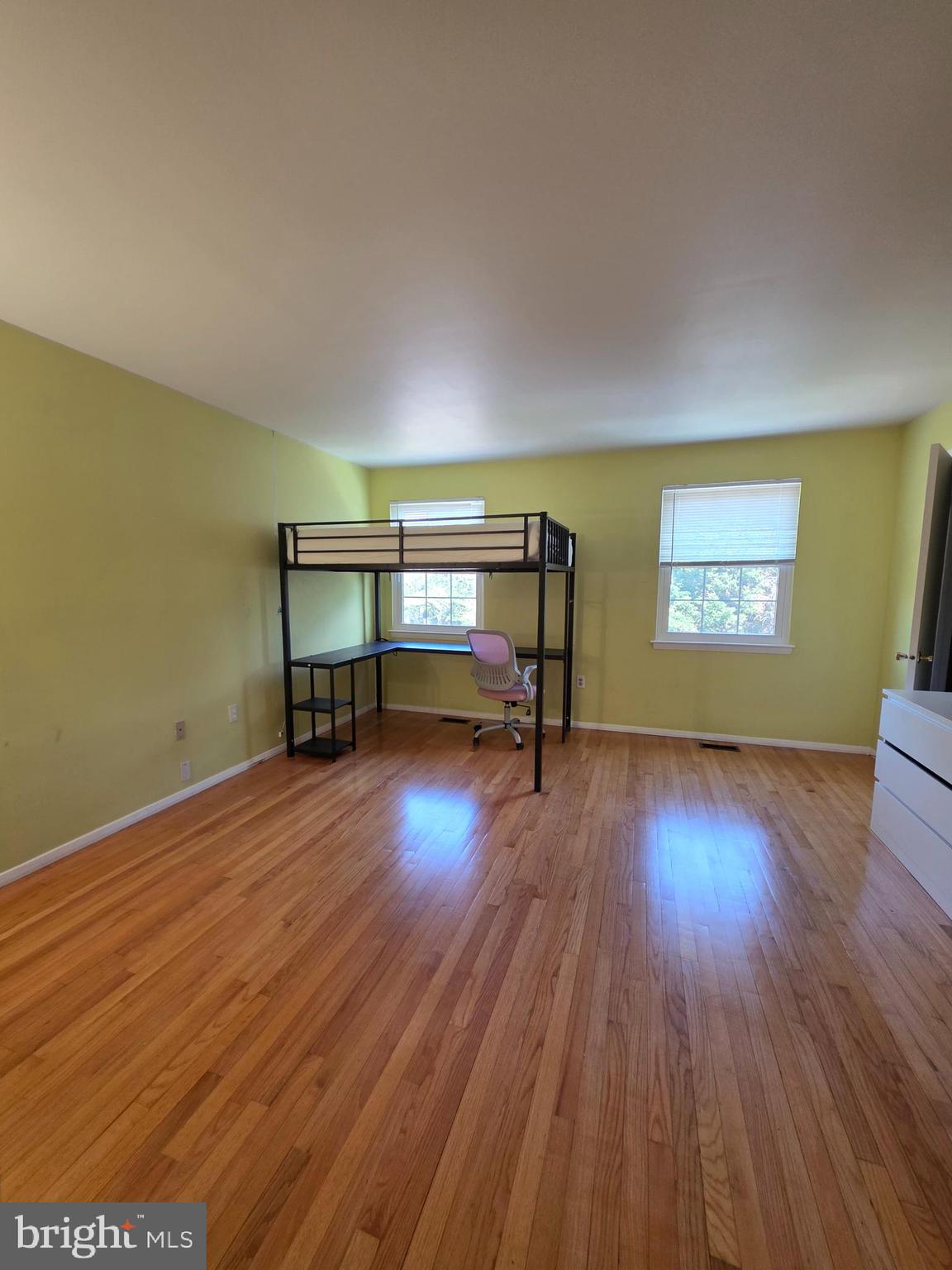 10 Casey Court Baltimore, MD 21228 - Photo 22 of 28 a view of room with window and wooden floor