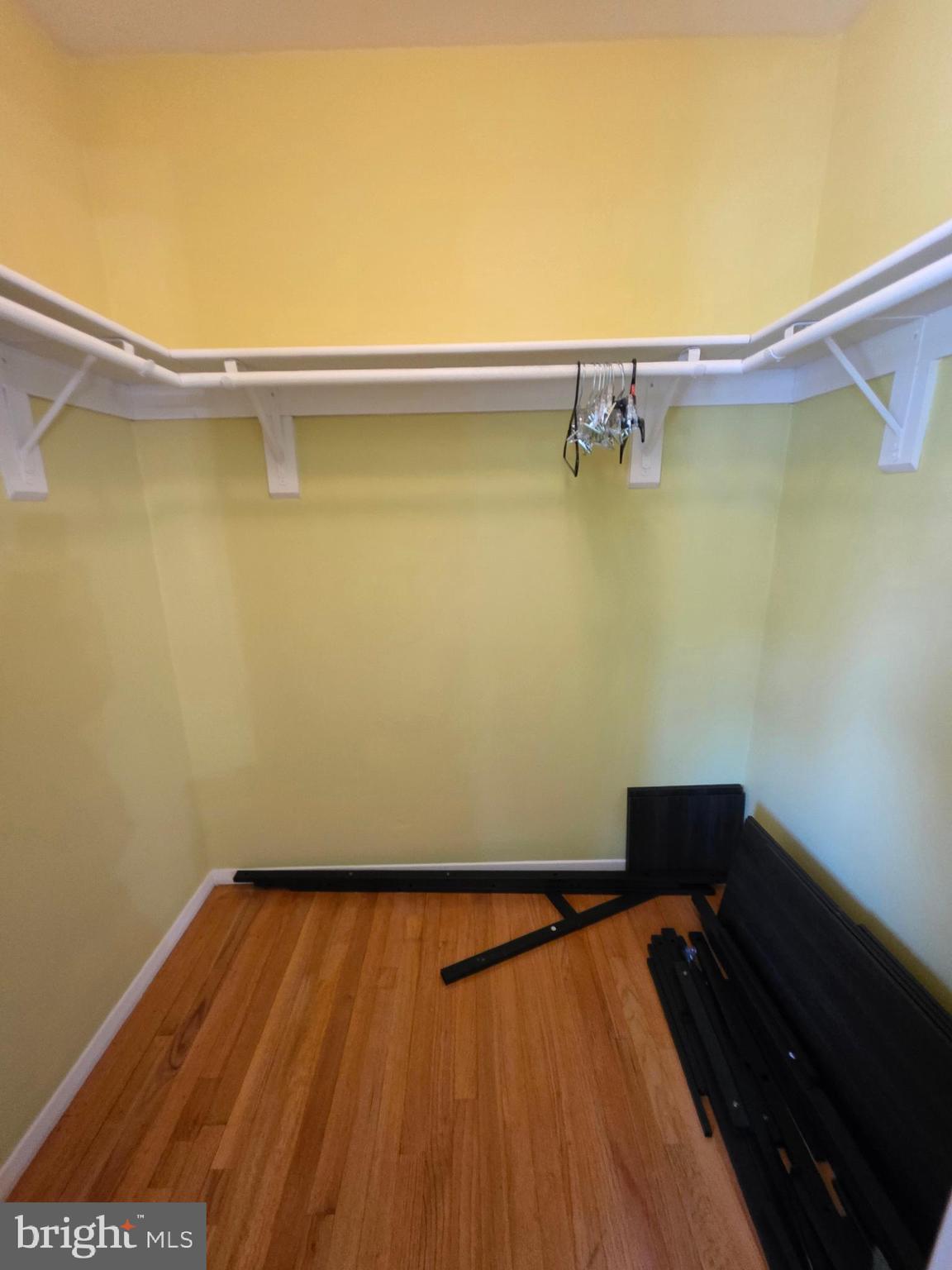 10 Casey Court Baltimore, MD 21228 - Photo 26 of 28 a view of a room with wooden floor and chair