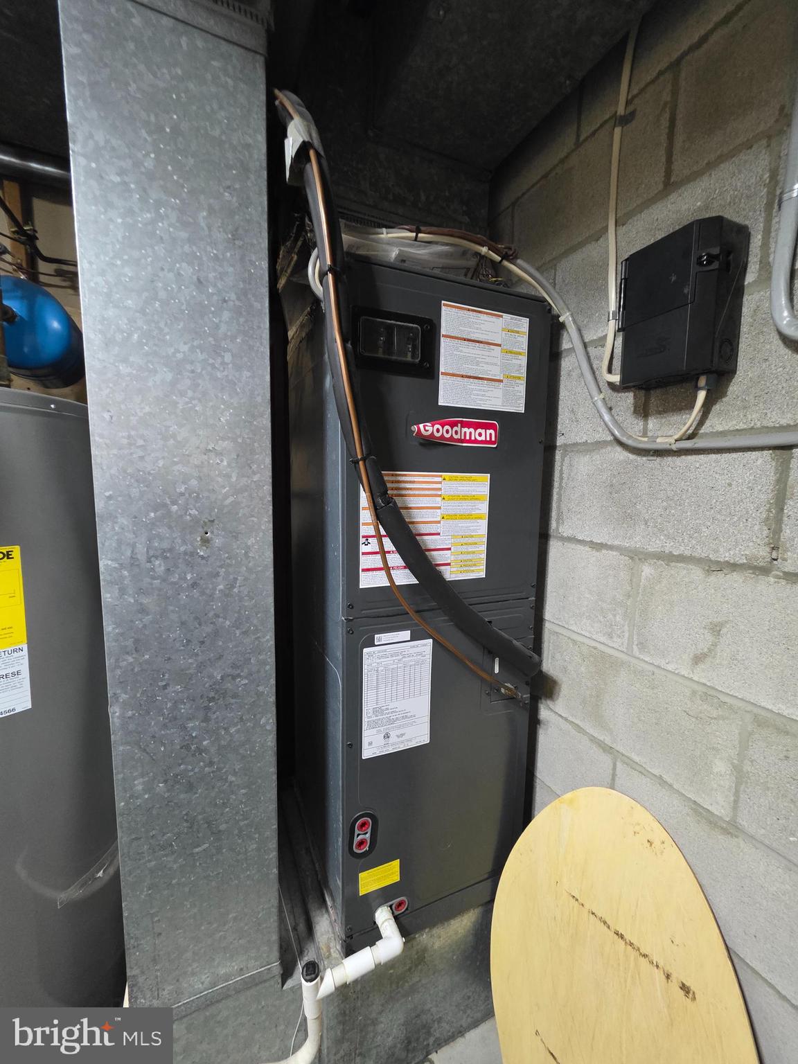 10 Casey Court Baltimore, MD 21228 - Photo 9 of 28 a bathroom with a toilet mirror and vanity