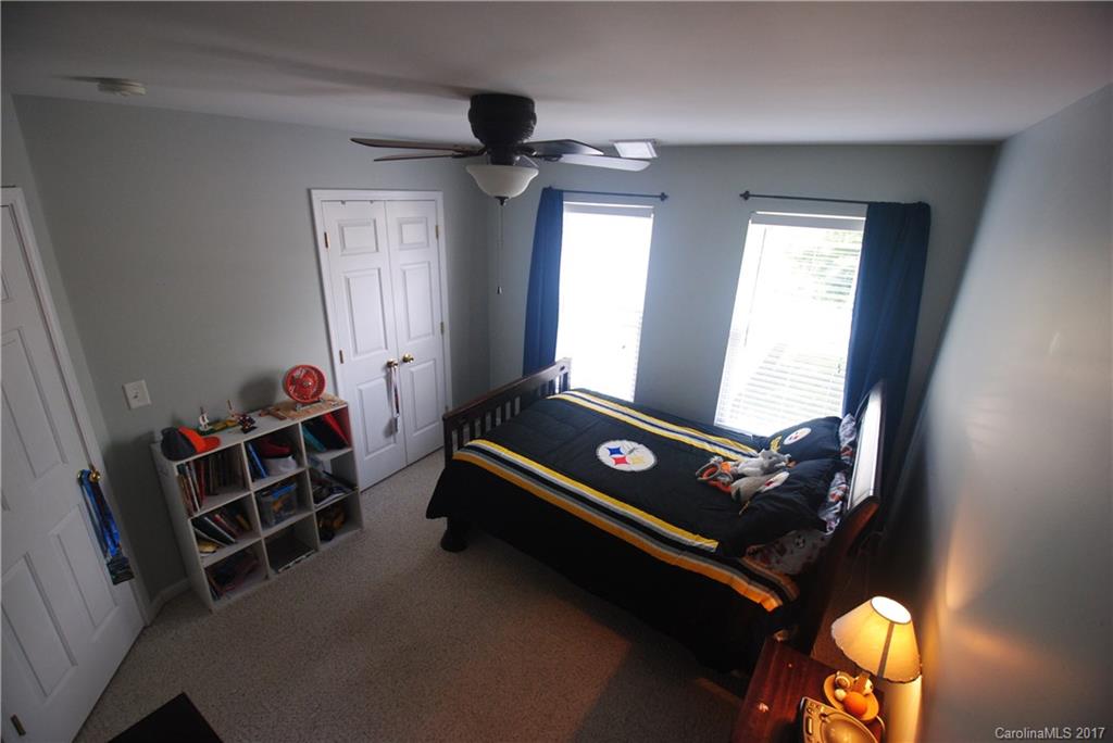 9834 Bailey Road Cornelius, NC 28031 - Photo 17 of 23 a room with furniture and window