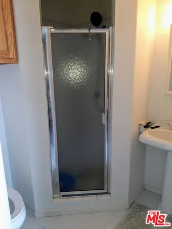 a bathroom with a sink and toilet