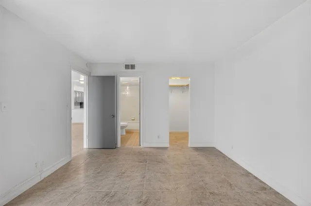 a view of a room with racks on the wall