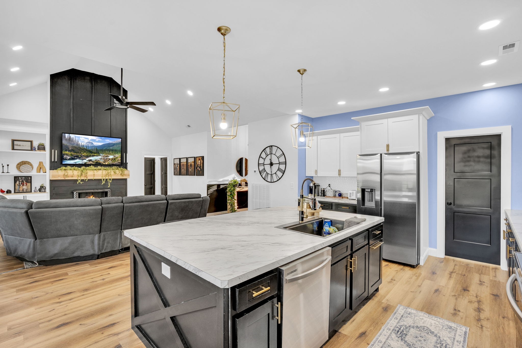 426 Maple Bend Road Winchester, TN 37398 - Photo 16 of 73 a kitchen with granite countertop a sink a counter top space stainless steel appliances and wooden floor