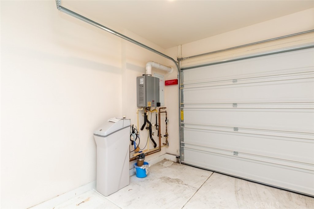 1095 Delpy View Vista Vista, CA 92084 - Photo 14 of 30 a view of a storage & utility room with stairs