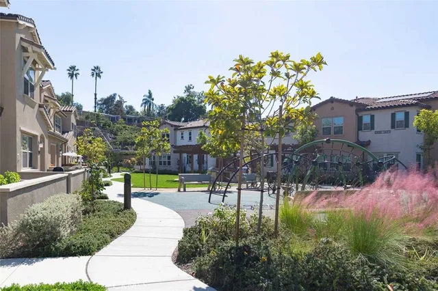 a view of a city with tall buildings