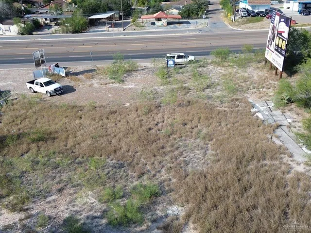 a view of a backyard of the house