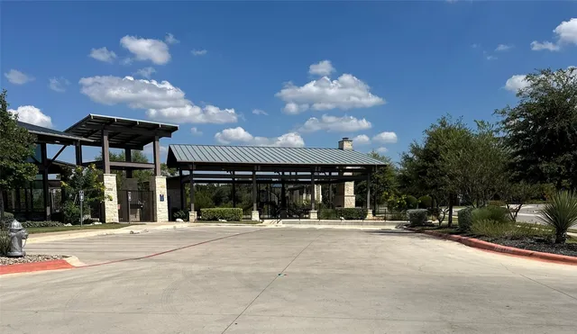 a view of a building with a street