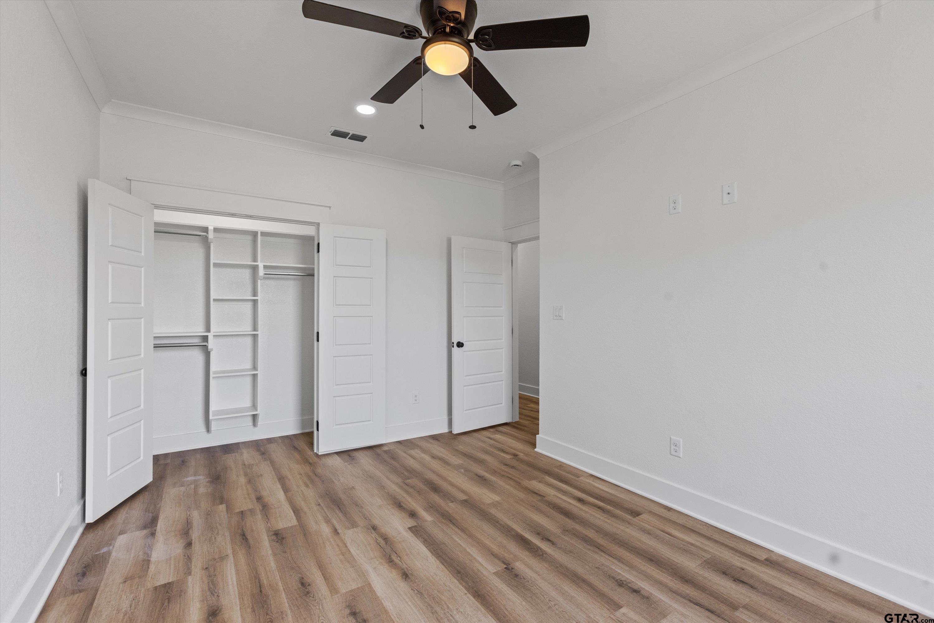 17763 Jayleen Lane Tyler, TX 75707 - Photo 20 of 23 a view of empty room with wooden floor
