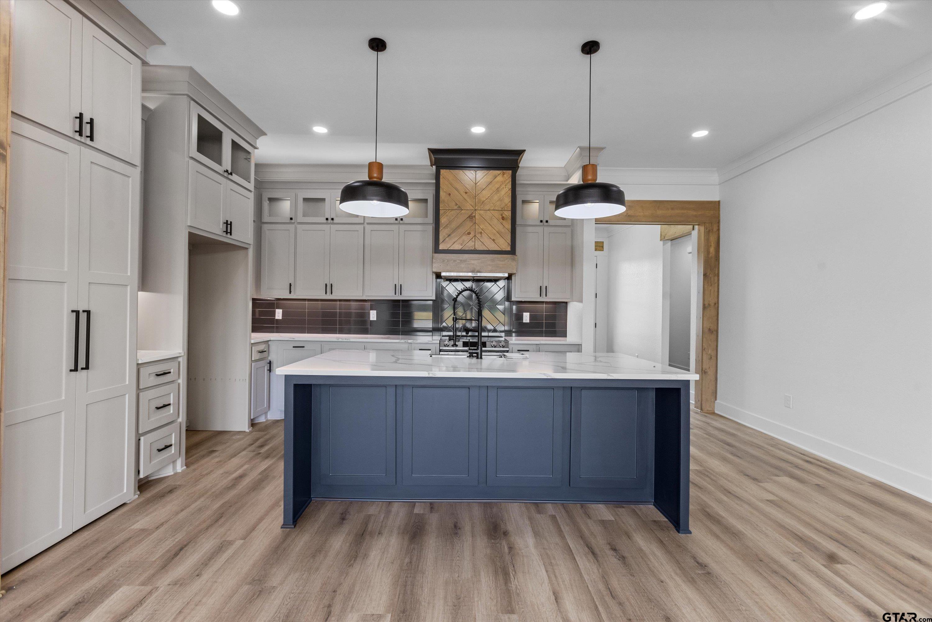 17763 Jayleen Lane Tyler, TX 75707 - Photo 6 of 23 a kitchen with stainless steel appliances granite countertop a refrigerator a sink dishwasher and a wooden cabinets