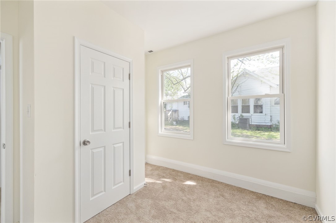 5205 Blue Ridge Avenue Richmond, VA 23231 - Photo 16 of 30 an empty room with windows