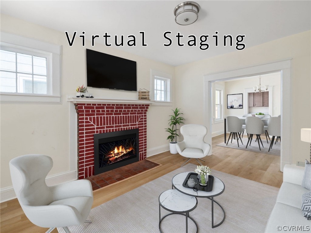 5205 Blue Ridge Avenue Richmond, VA 23231 - Photo 5 of 30 a living room with furniture a flat screen tv and a fireplace