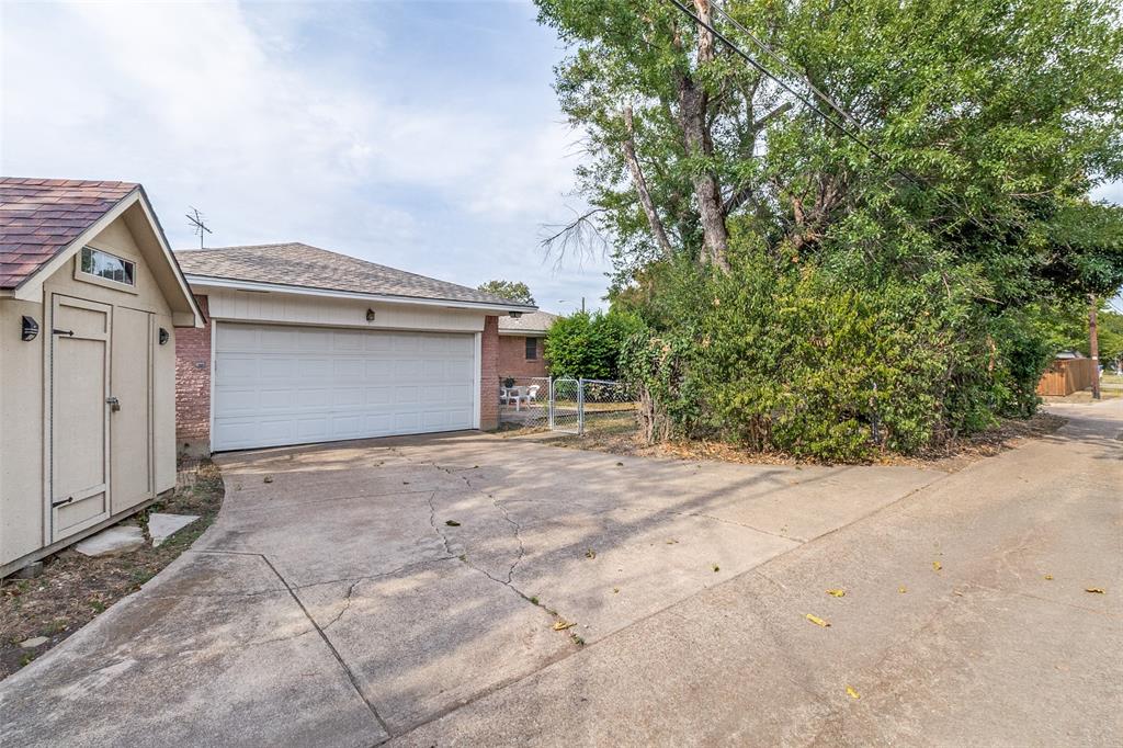 8060 Woodhue Road Dallas, TX 75228 - Photo 29 of 29 Two Car Garage Attached with separate Storage shed