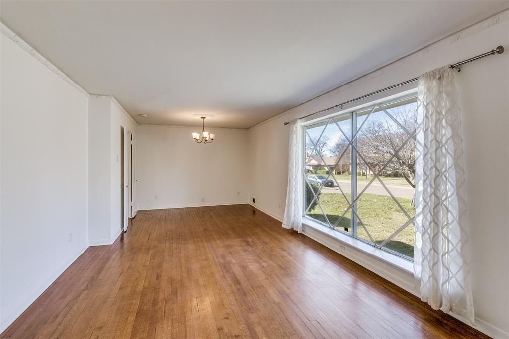 8060 Woodhue Road Dallas, TX 75228 - Photo 6 of 29 Spacious and bright living and dining room