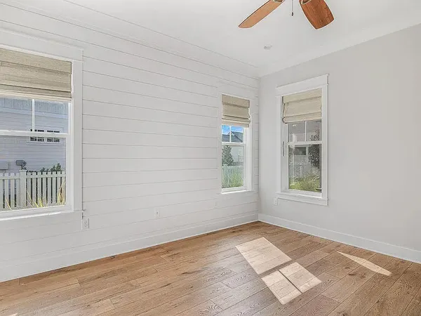 an empty room with windows