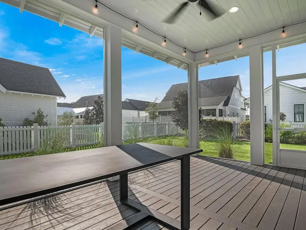 a balcony with wooden floor