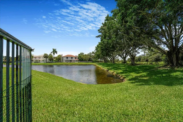 a view of a lake with a big yard