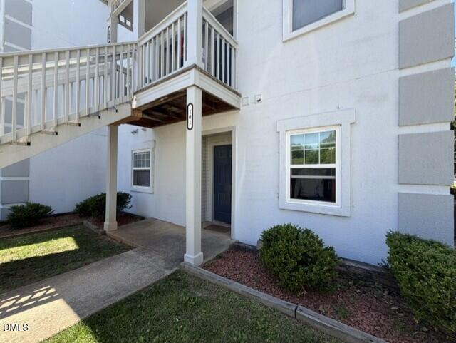2506 Avent Ferry Road, Unit 101 Raleigh, NC 27606 - Photo 2 of 19 a house view with a garden space