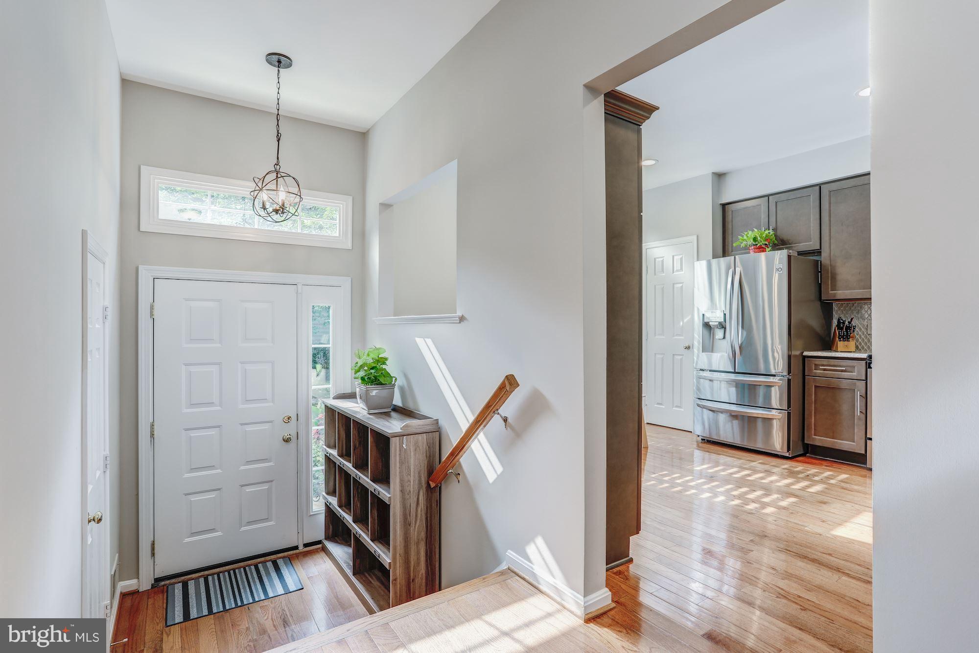 1209 Weatherstone Court Reston, VA 20194 - Photo 3 of 30 Foyer leading to Fabulous Kitchen