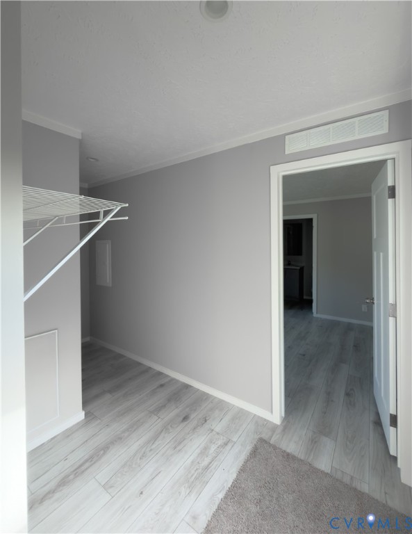 0 Dameron Street Callao, VA 22435 - Photo 2 of 6 Wood-finish flooring, light gray wall tones, crown