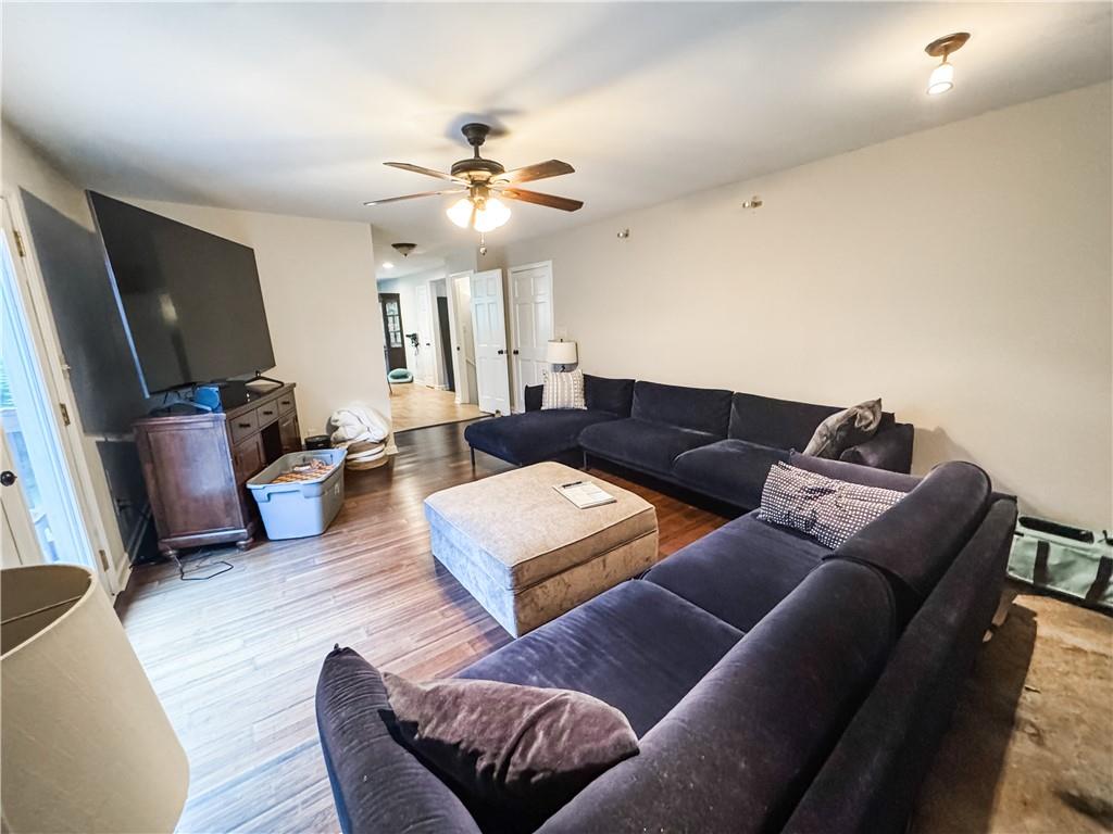 230 Chaffin Ridge Trace Roswell, GA 30075 - Photo 8 of 23 a living room with furniture and a flat screen tv