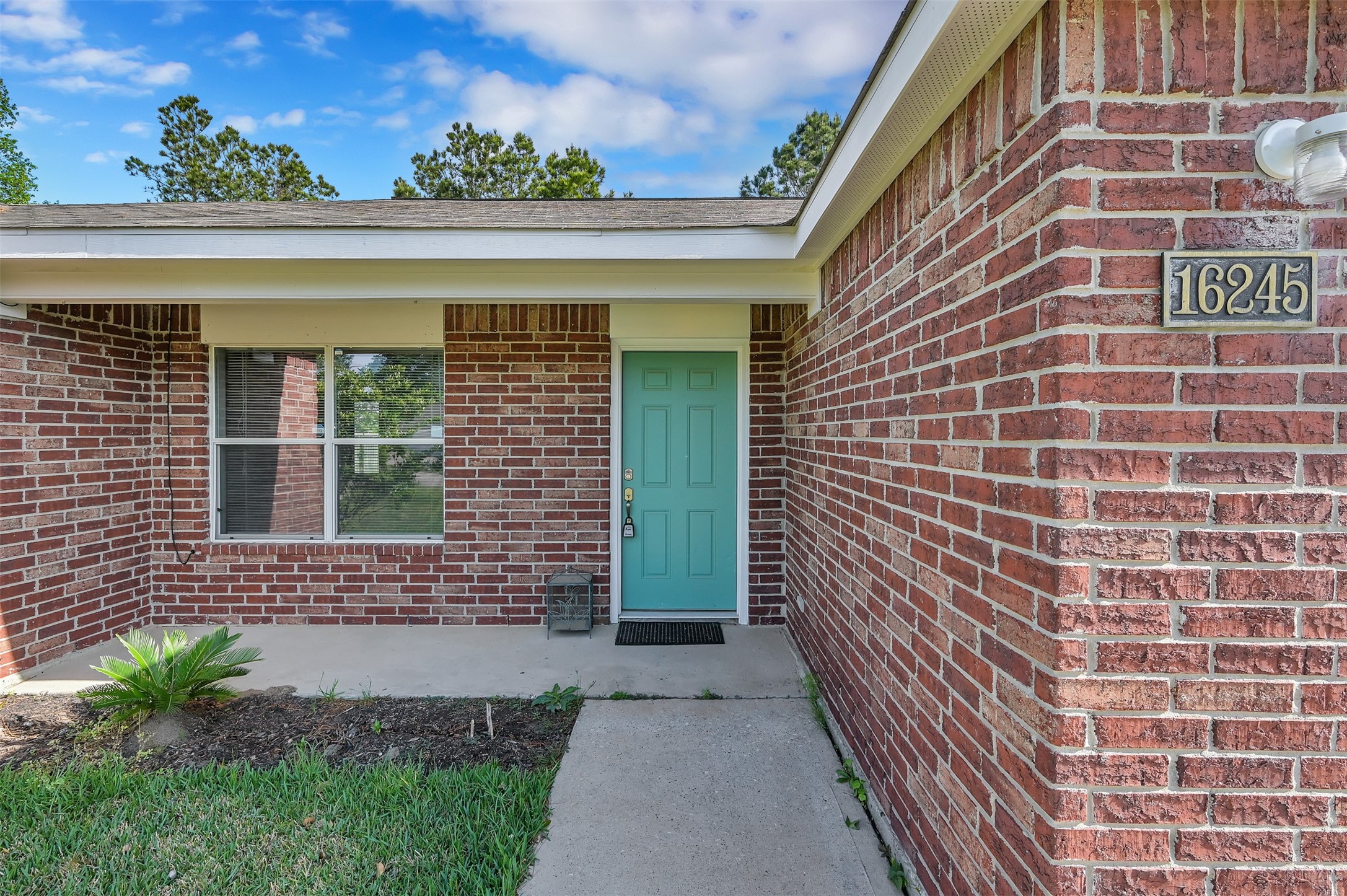 16245 Sun View Lane Conroe, TX 77302 - Photo 2 of 19 a view of entrance