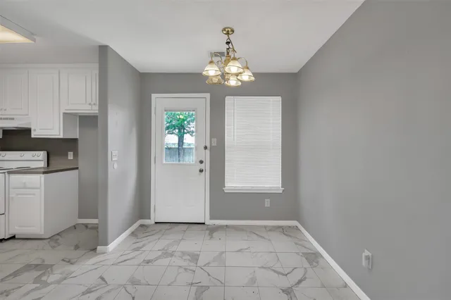 a view of an empty room with window