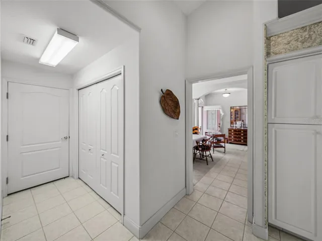 a dining room with furniture window and outdoor view