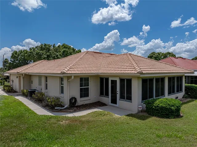 a view of a house with a garden