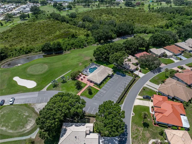 an aerial view of a house with a garden