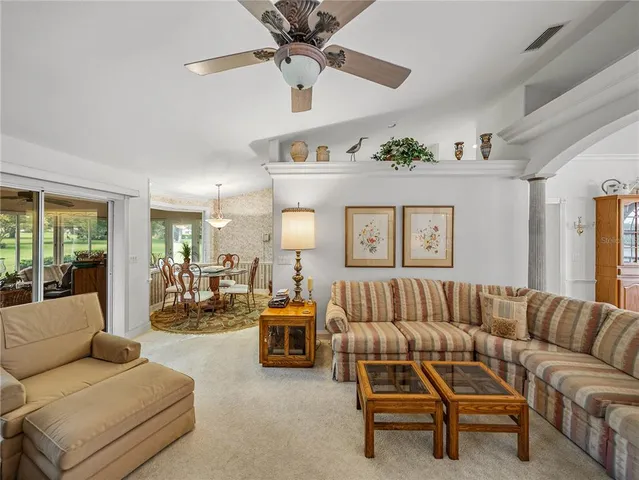 a living room with furniture and a couch