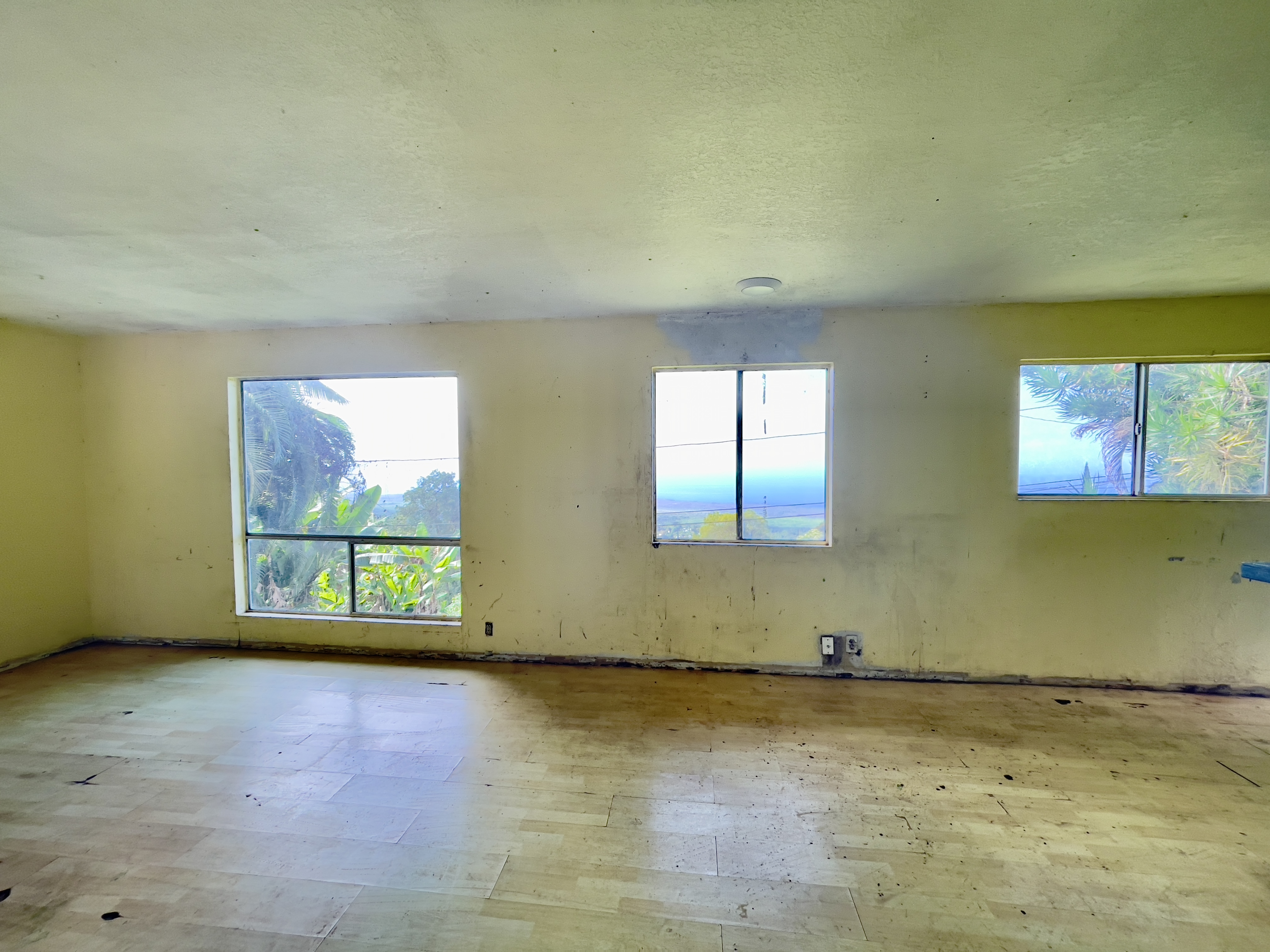 83-5586 Hawaiʻi Belt Road Captain Cook, HI 96704 - Photo 11 of 23 a view of an empty room with a window